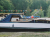 cropped-banked-boat
